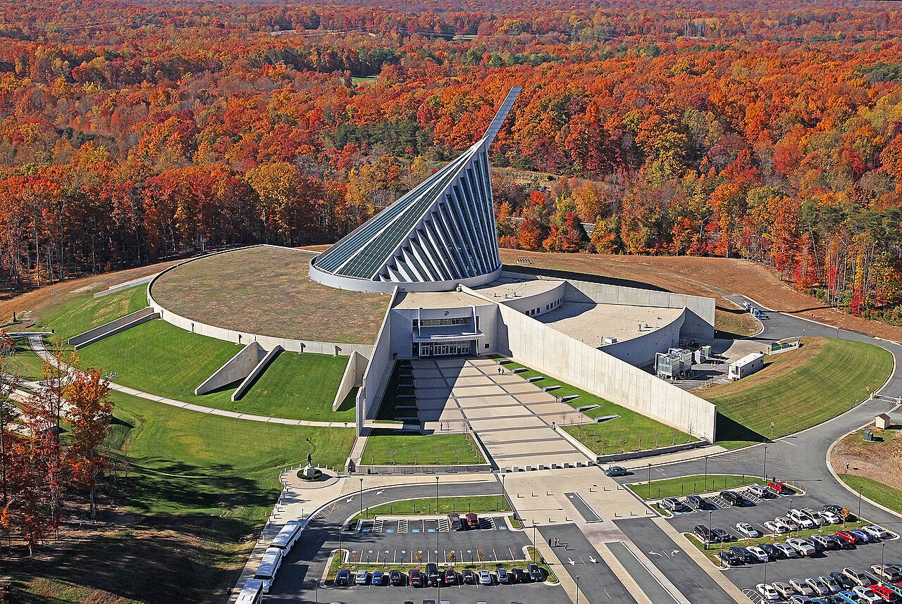 National Museum of the Marine Corps surrounded by bright autumn foliage in Prince William County, Virginia.