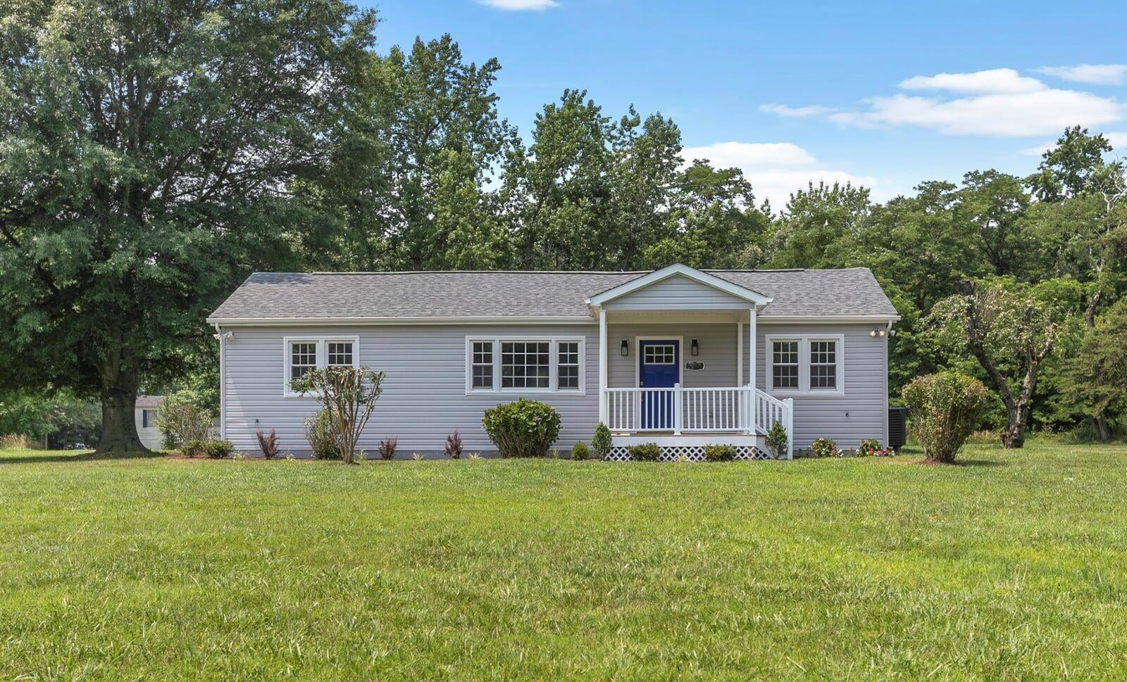 Project 07: single-story home with a front porch and lawn